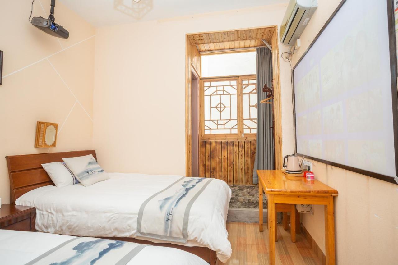 Nanjing Tulou Xinyuan Homestay Buitenkant foto