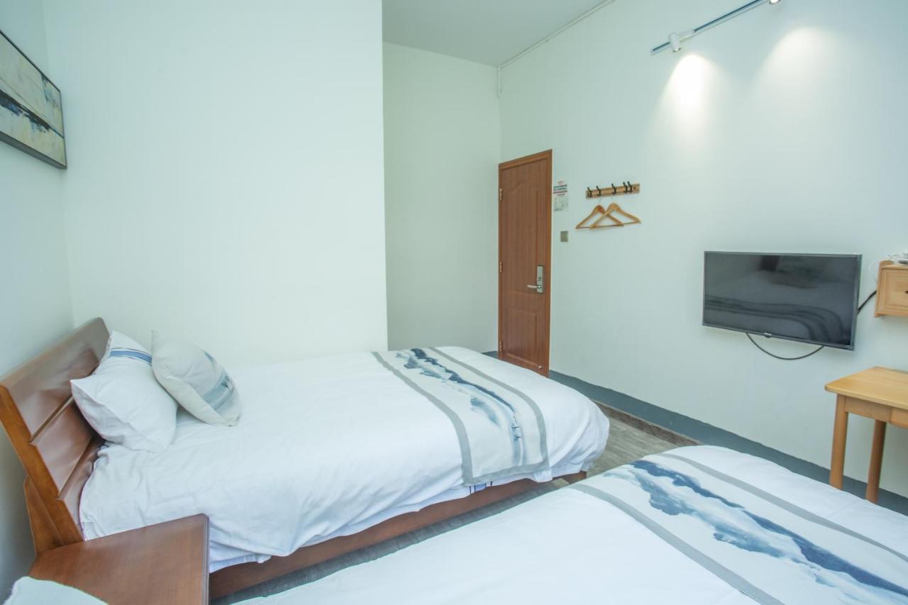 Nanjing Tulou Xinyuan Homestay Buitenkant foto