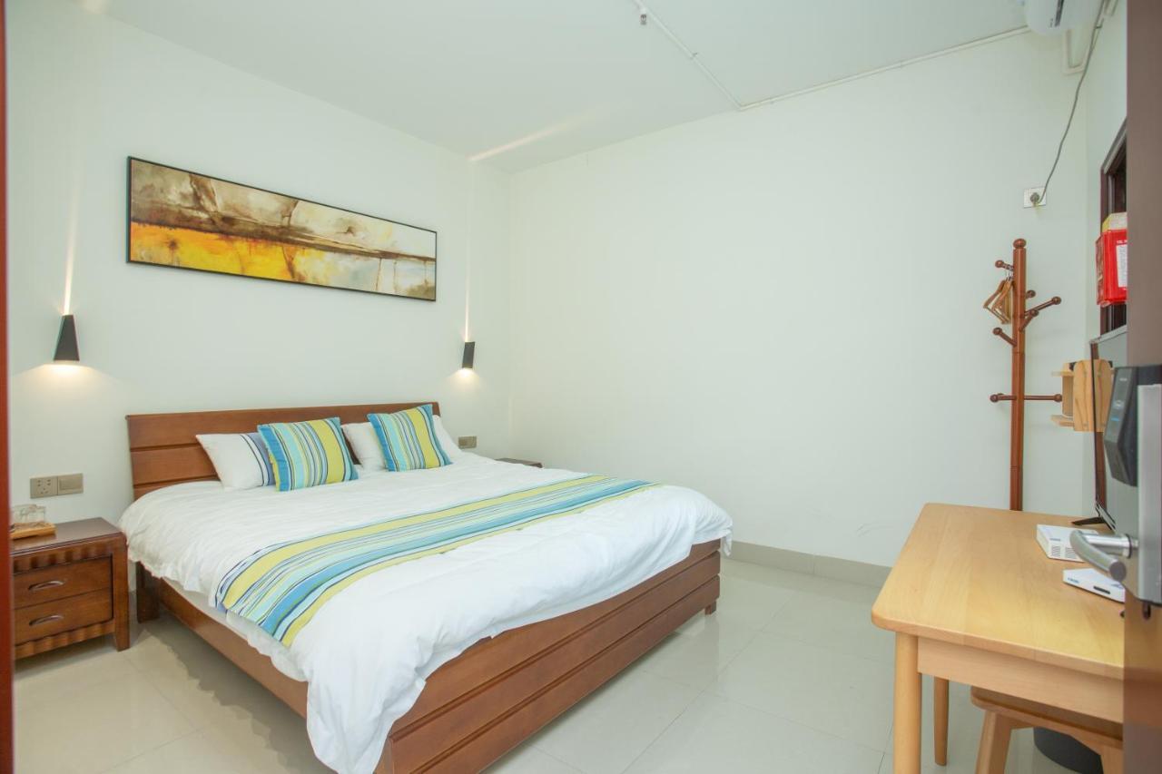 Nanjing Tulou Xinyuan Homestay Buitenkant foto